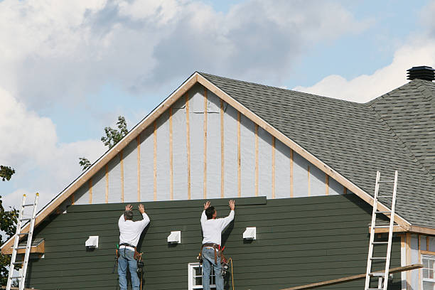 Professional Storm Damage Siding Repair technician working in Central City, KY